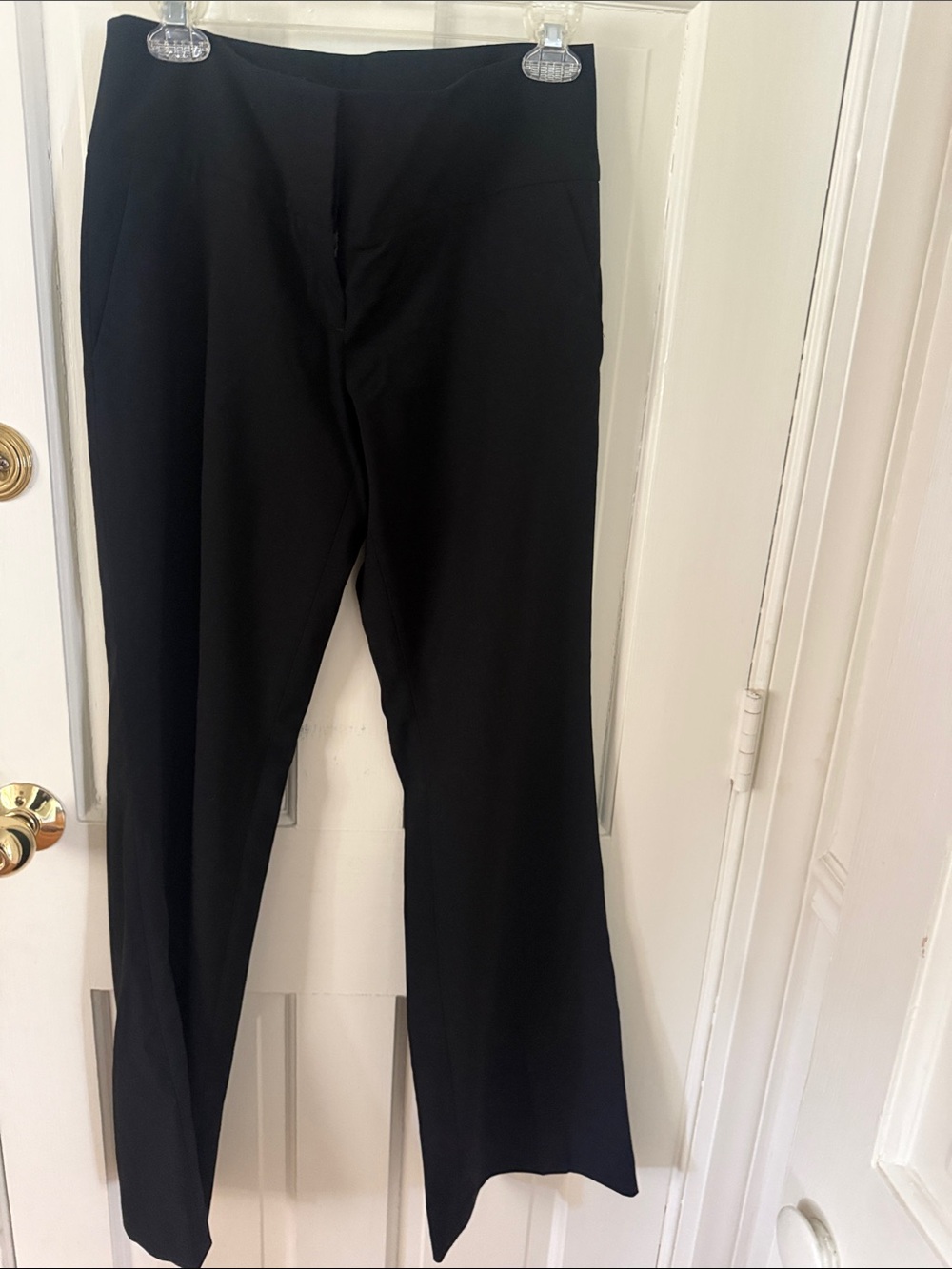Go from work to dinner in these lightweight Women’s DKNYC black trousers, sz 4.